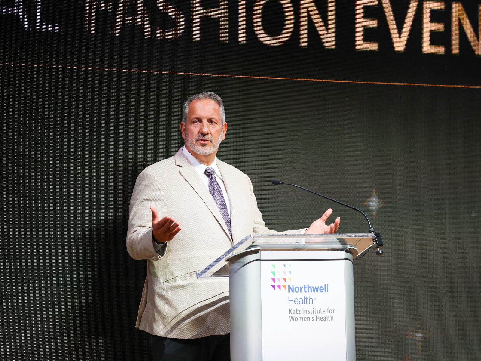 Frank Grande Jr. speaking at the Northwell Health Katz Institute for Women's Health podium